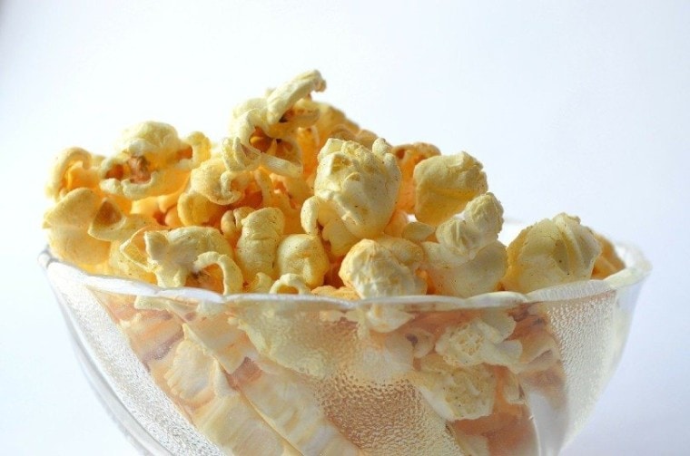 porpcorns in a glass bowl