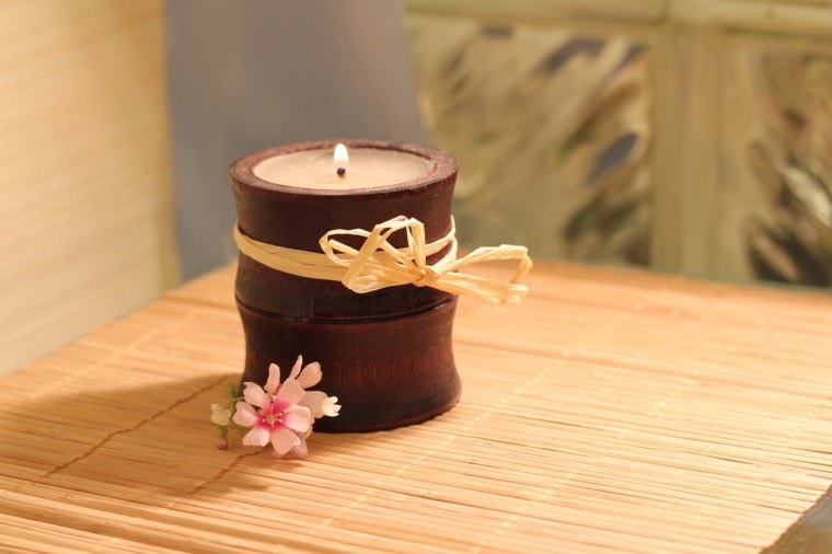 candle in a bamboo jar