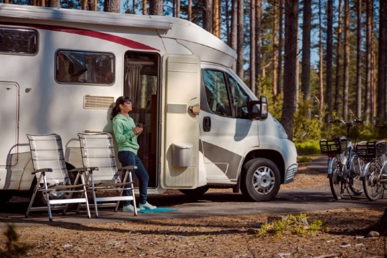 woman camping with her RV