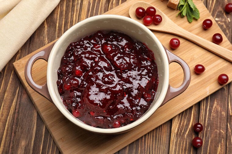 Cranberry sauce on a wooden background