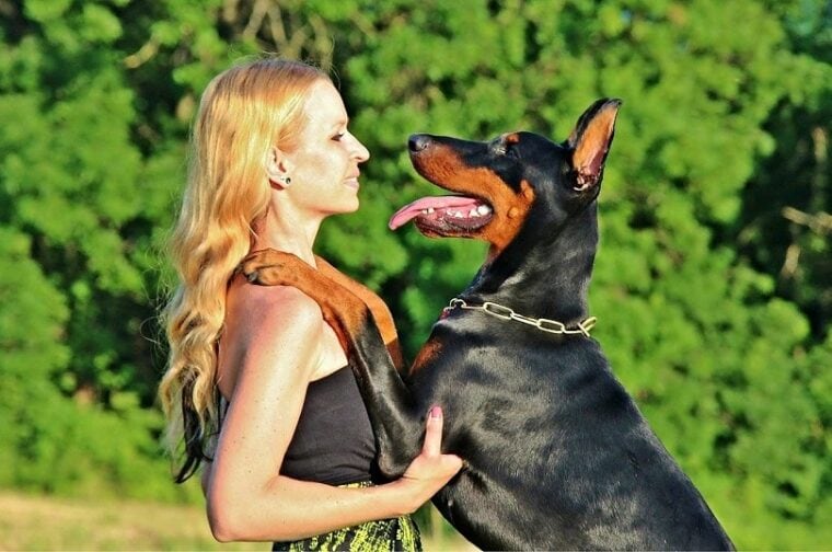 owner with her doberman