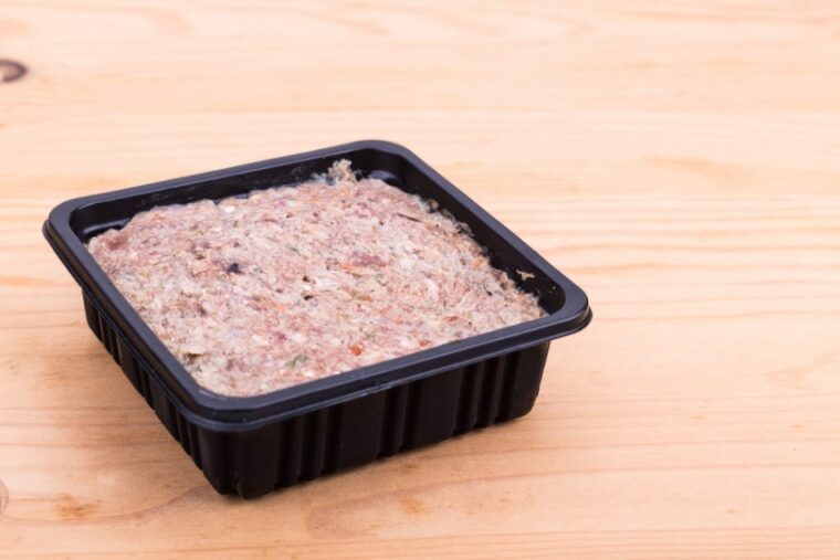 Lamb meal in a black container