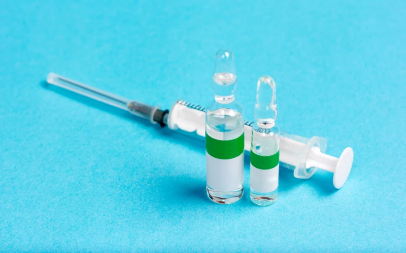 syringe and three ampoules of antivenom