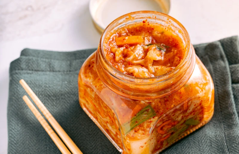 kimchi in a clear glass jar