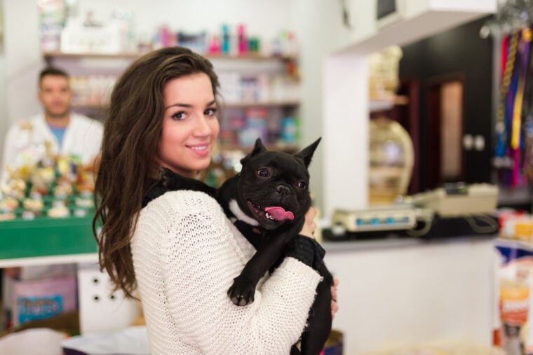 woman with her French bulldog