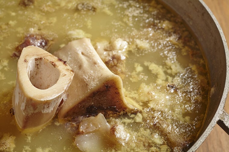 A pot of bone broth being cooked