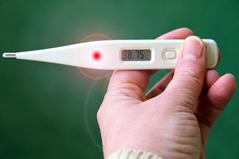 Thermometer reading showing fever