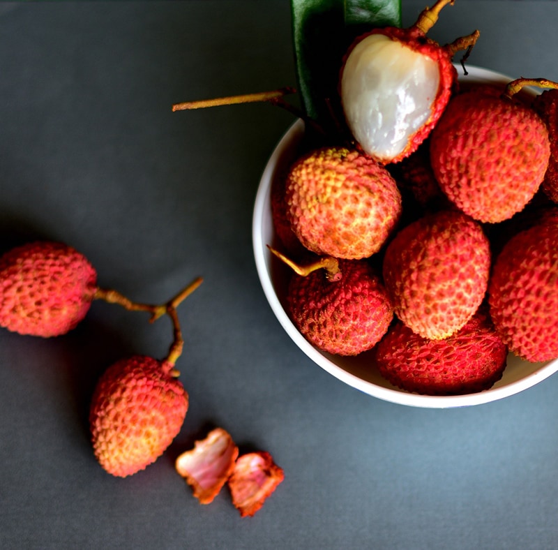 a bowl of lychee on the table