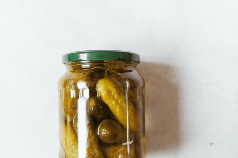 Close-up Photo of Pickles on a Glass Jar