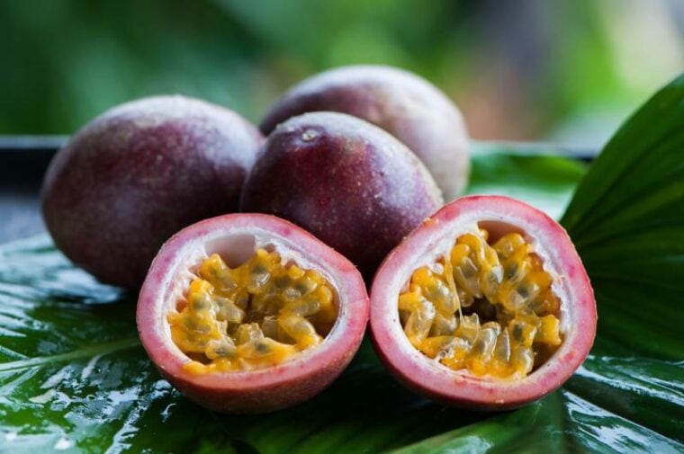 passion fruit whole and slise on a natural background