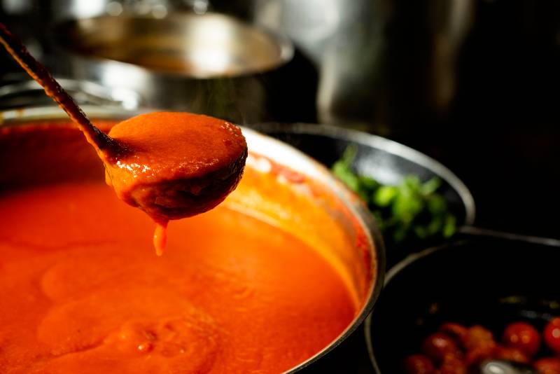 closeup of a saucepan with tomato sauce