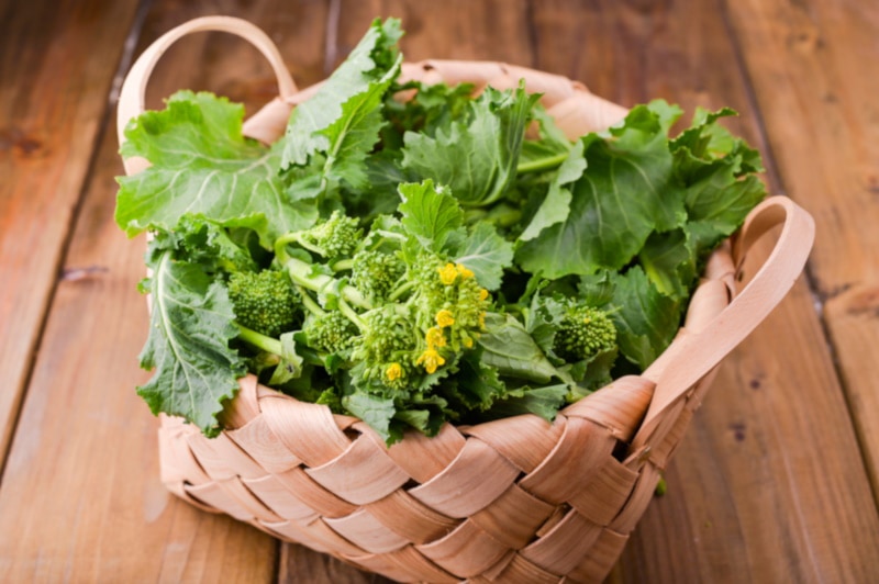 Turnip greens in a woven basket