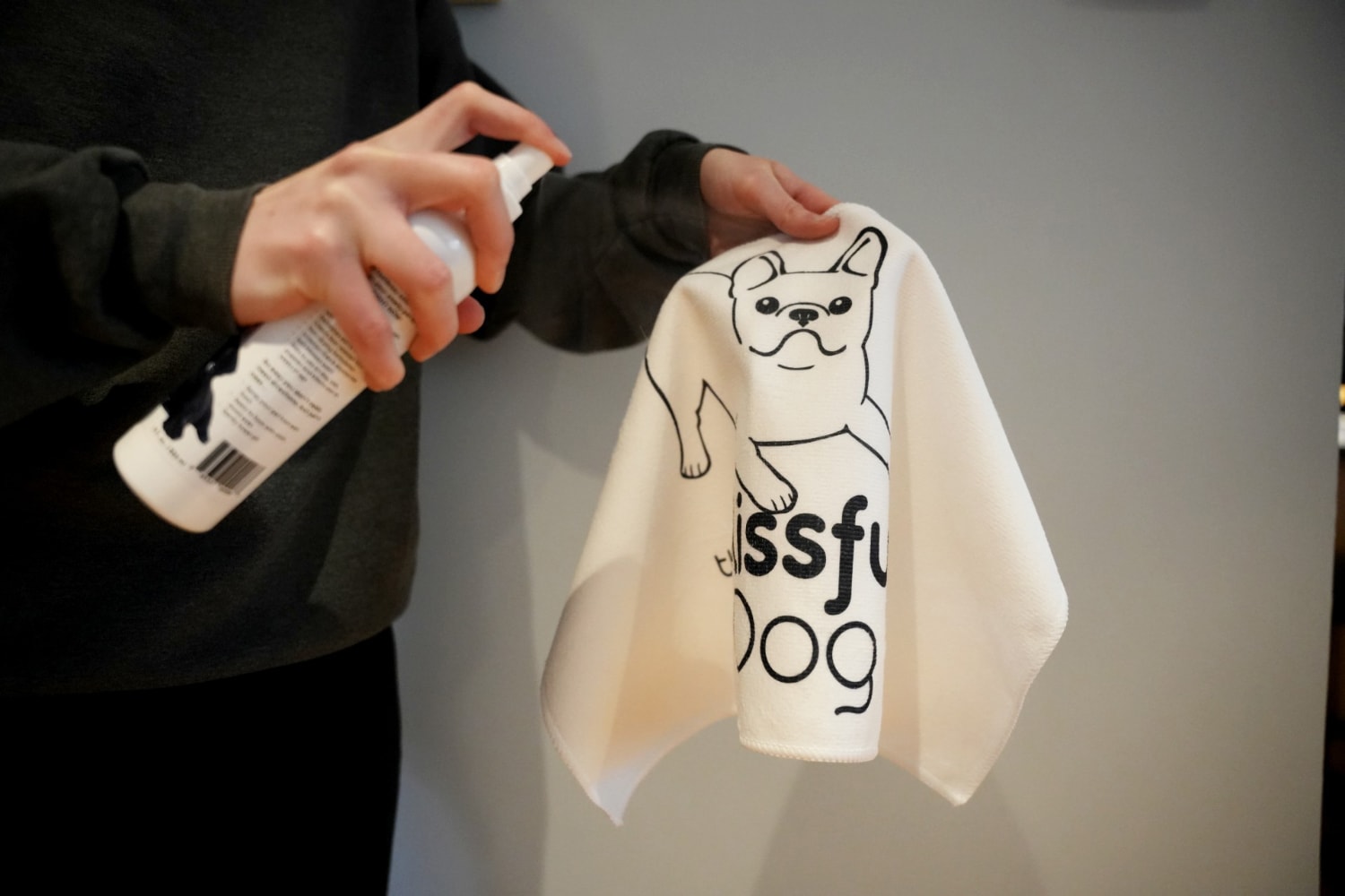 The Blissful Dog No H2O Spray Pet Shampoo - spraying the shampoo on towel