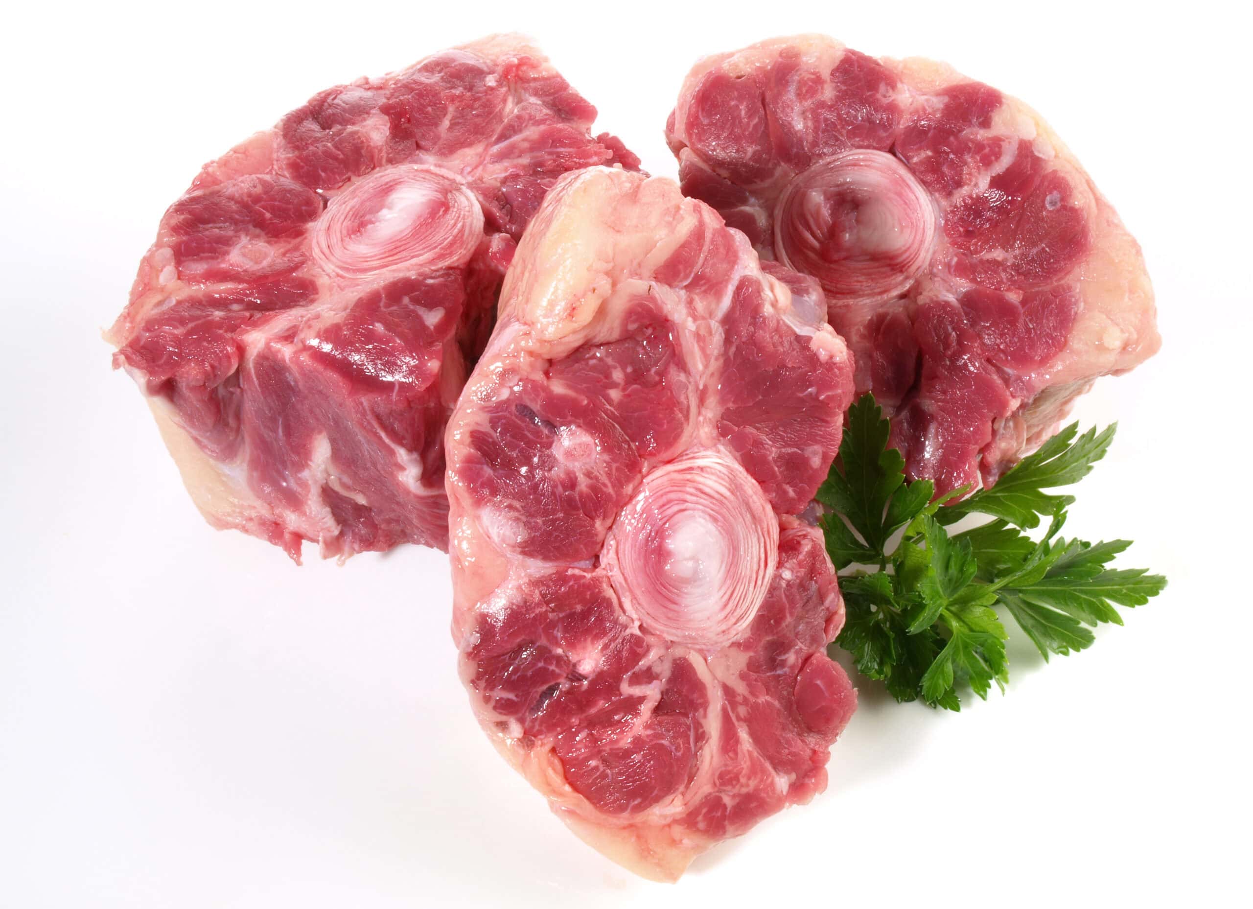 Raw Oxtail Pieces on white Background