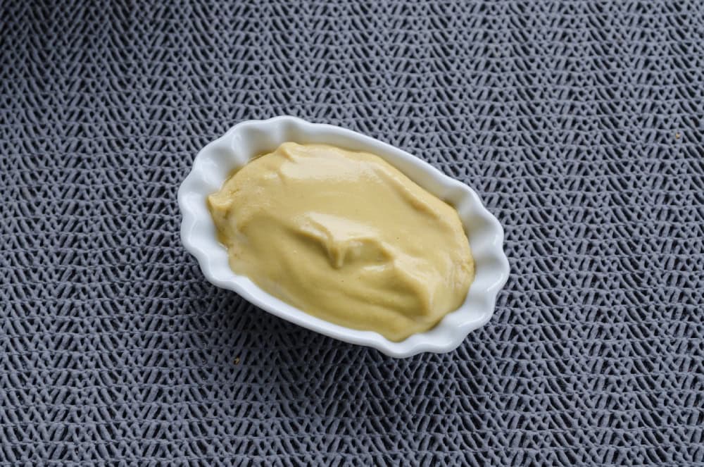 mustard on a saucer plate